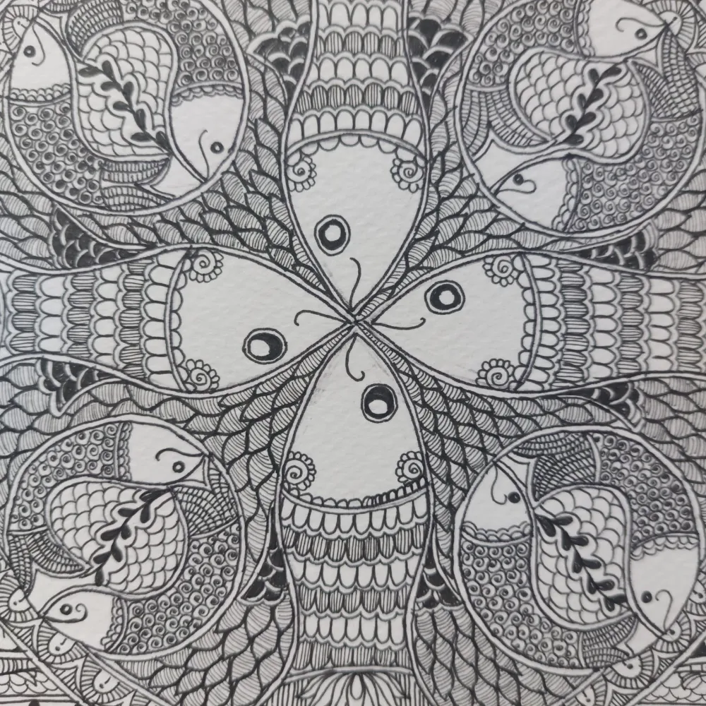 Close-up detail of handmade Madhubani Kachhni fish artwork